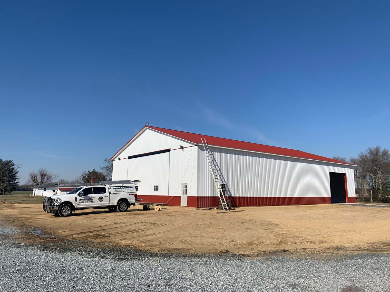 RS Lightning Protection service truck at a completed commercial building installation